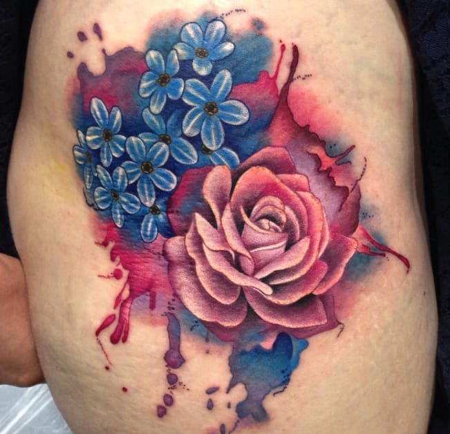 点击大图看下一张：迷人的植物彩虹色花卉纹身图案来自于纹身师艾米