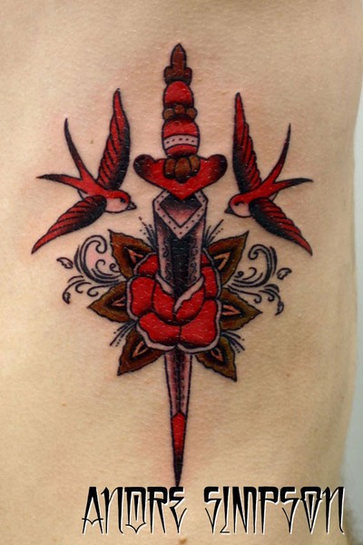 点击大图看下一张：舞剑之燕花刺青图案