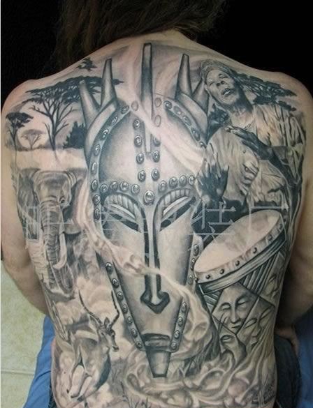 点击大图看下一张：满背霸气非洲面具图腾纹身