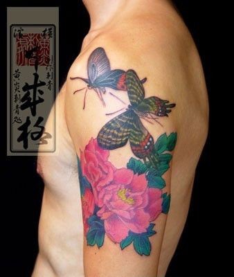 点击大图看下一张：蝴蝶牡丹纹身作品图案
