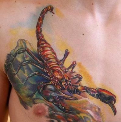 点击大图看下一张：三张胸前彩色蝎子纹身图案作品