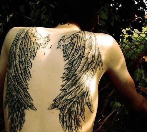 点击大图看下一张：后背部左右两只黑色天使翅膀纹身图