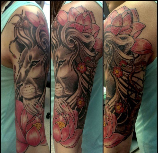 点击大图看下一张：大臂膀上威武的雄狮纹身图案欣赏
