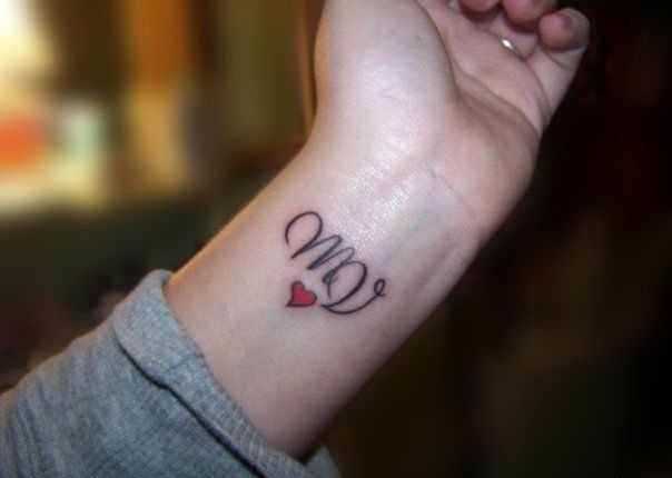 点击大图看下一张：多款漂亮的花体字纹身图案