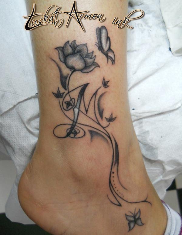 点击大图看下一张:多款漂亮的花体字纹身图案