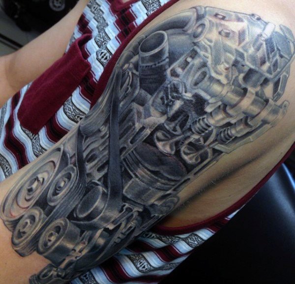 点击大图看下一张:让人感觉无比有力的男性生物机械花臂纹身图案