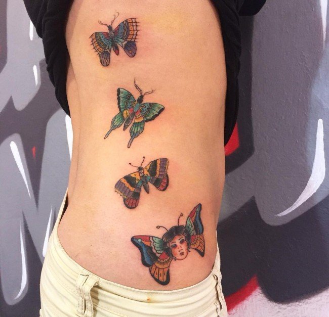 点击大图看下一张:美丽的女性都喜欢的漂亮的蝴蝶纹身图案