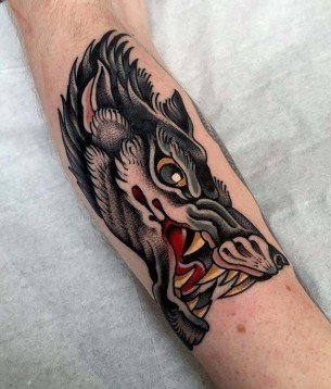 点击大图看下一张：多种风格凶猛的狼纹身图案