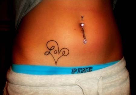 点击大图看下一张：女孩子们性感腹部上漂亮的纹身图案