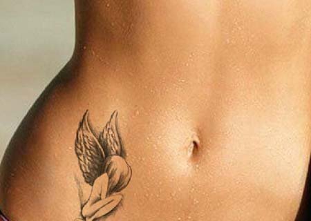 点击大图看下一张：女孩子们性感腹部上漂亮的纹身图案