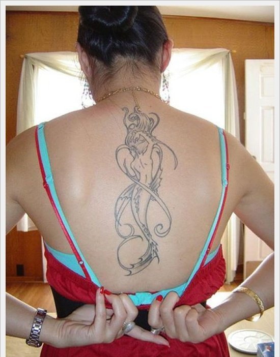 点击大图看下一张:漂亮性感女孩身上美丽的美人鱼纹身图案鱼