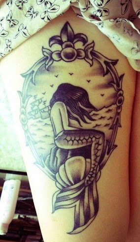 点击大图看下一张:漂亮性感女孩身上美丽的美人鱼纹身图案鱼