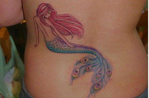 点击大图看下一张:漂亮性感女孩身上美丽的美人鱼纹身图案鱼