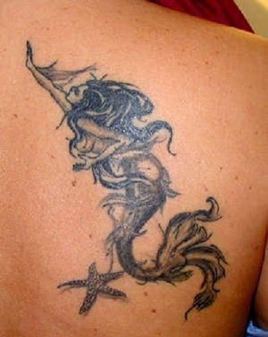 点击大图看下一张:漂亮性感女孩身上美丽的美人鱼纹身图案鱼