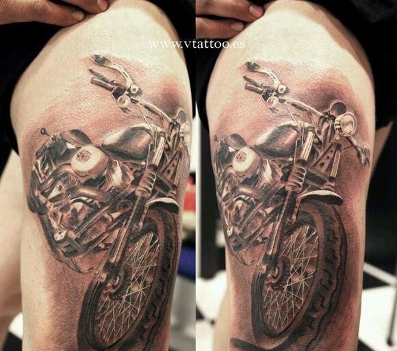 点击大图看下一张：个性的摩托车纹身图案分享