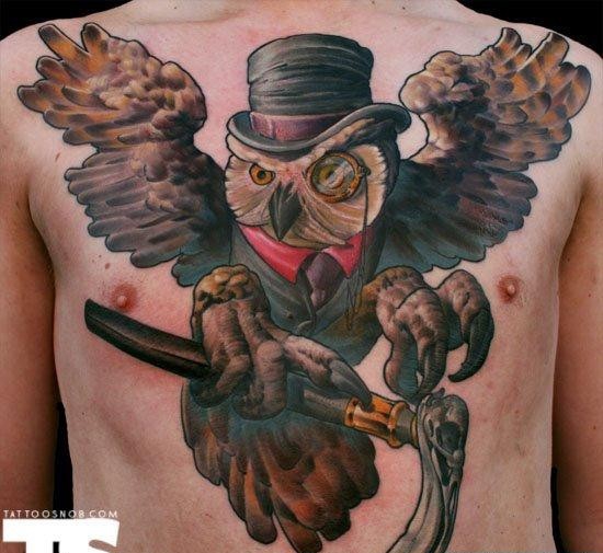 点击大图看下一张：国外大师一款猫头鹰纹身图案
