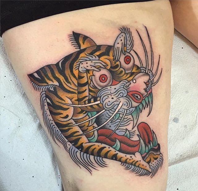 点击大图看下一张：错综复杂和分层设计的传统动物纹身图案