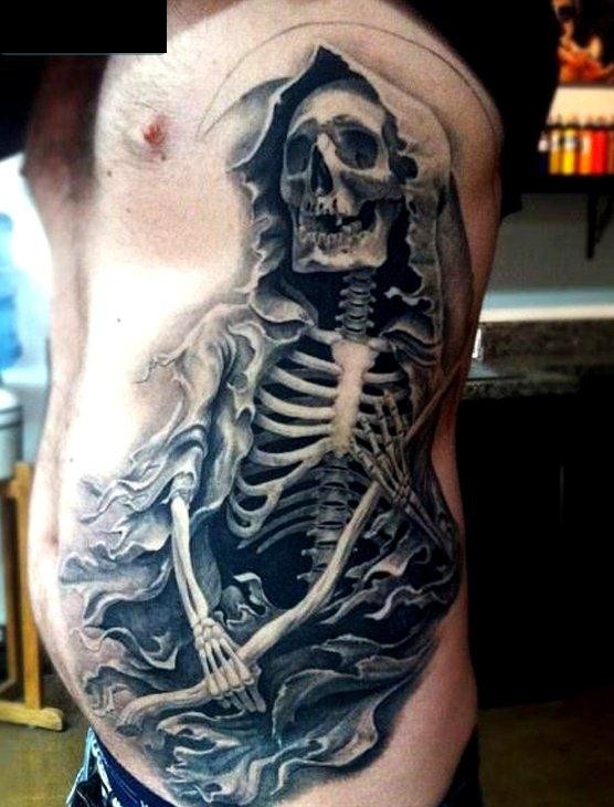 点击大图看下一张：侧腰上一张经典的死神纹身图案
