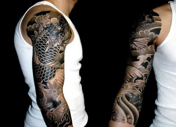 点击大图看下一张：男性手臂上帅气的半袖纹身图案