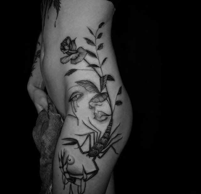点击大图看下一张：性感的黑灰色花卉纹身图案来自纹身师塔利