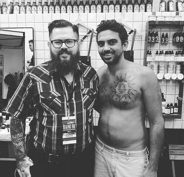 点击大图看下一张：性感的黑灰色花卉纹身图案来自纹身师塔利