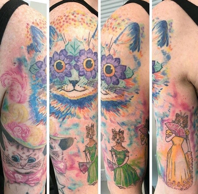 点击大图看下一张：花臂漂亮的全彩猫咪纹身图片