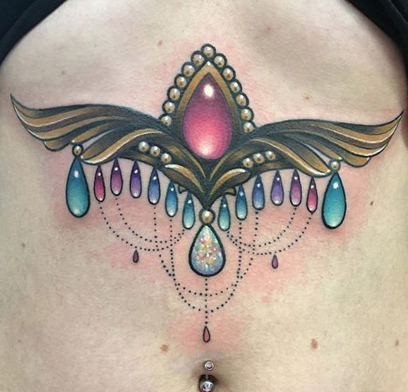 点击大图看下一张：彩色的光芒四射的宝石水晶纹身图案来自凯利