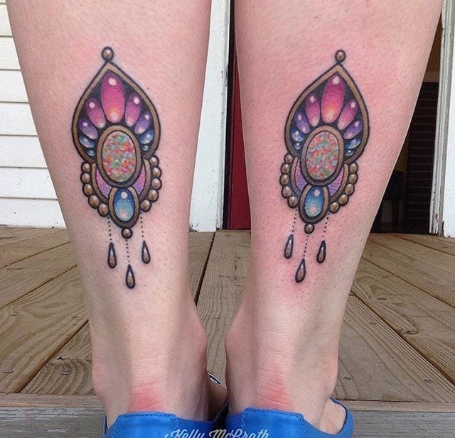 点击大图看下一张:彩色的光芒四射的宝石水晶纹身图案来自凯利