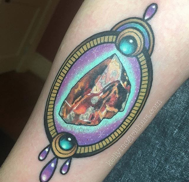 点击大图看下一张:彩色的光芒四射的宝石水晶纹身图案来自凯利