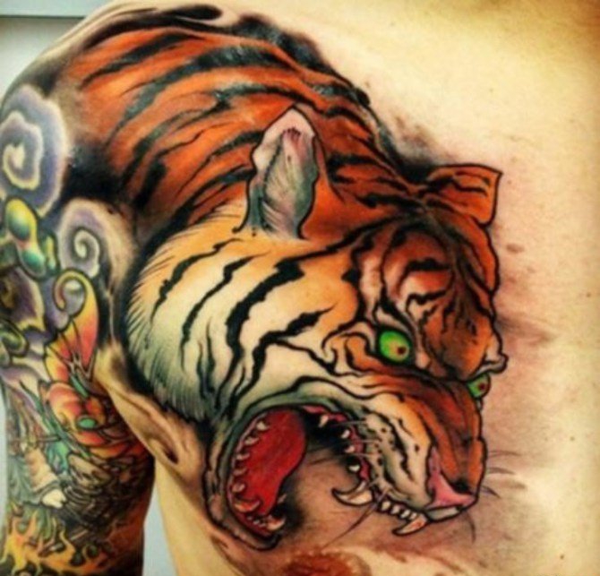 点击大图看下一张:多种风格帅气的老虎纹身图案