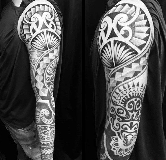 点击大图看下一张：男性强壮有力的花臂部落图腾纹身图案