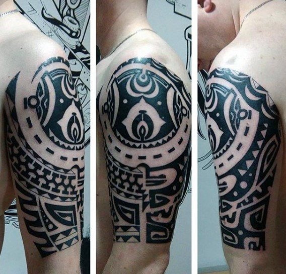 点击大图看下一张：男性强壮有力的花臂部落图腾纹身图案