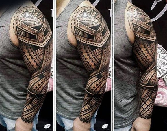 点击大图看下一张：男性强壮有力的花臂部落图腾纹身图案