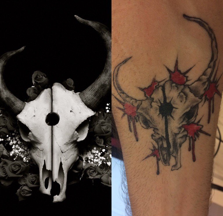点击大图看下一张：手臂上恶魔猎手的羊头纹身小游戏人物纹身图片