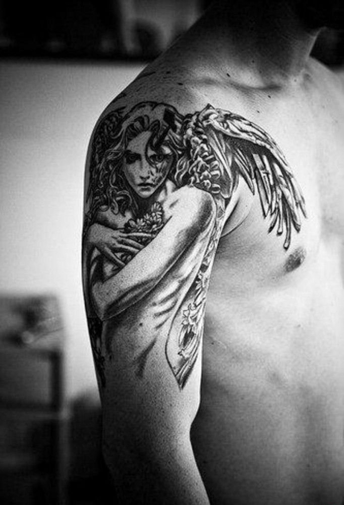 点击大图看下一张：手大臂膀上超帅气的天使纹身图案