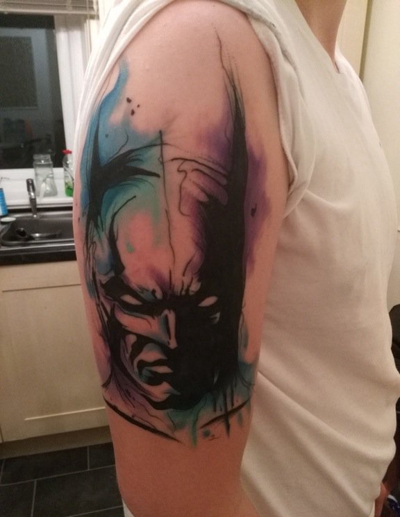点击大图看下一张：男子右手大臂膀上帅气的水彩蝙蝠侠肖像纹身图片