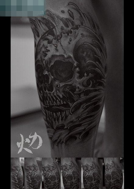 点击大图看下一张：男生腿部经典很酷的骷髅纹身图案