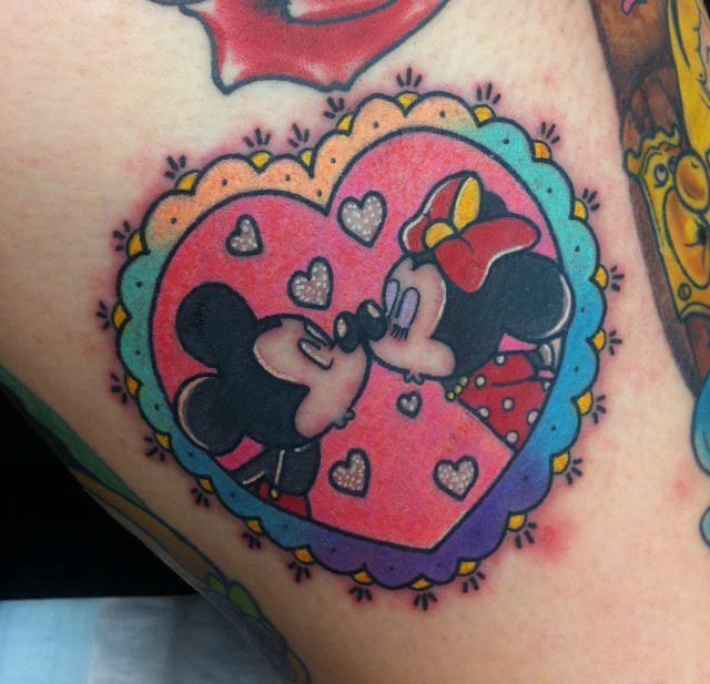点击大图看下一张：迪士尼卡通情侣头像纹身动漫人物的纹身图案