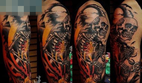 点击大图看下一张：手臂精美超酷的骷髅纹身图案