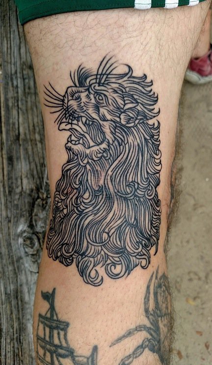 点击大图看下一张：简单个性线条纹身动物狮子头纹身图片