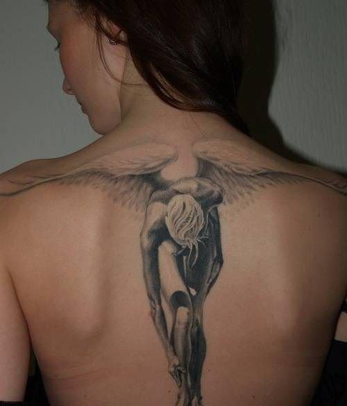 点击大图看下一张：女性身上漂亮的天使翅膀纹身图案欣赏