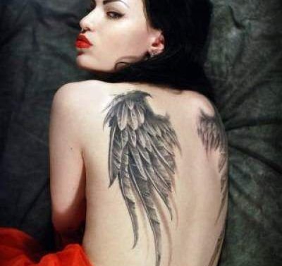 点击大图看下一张：女性身上漂亮的天使翅膀纹身图案欣赏