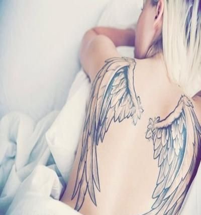 点击大图看下一张：女性身上漂亮的天使翅膀纹身图案欣赏