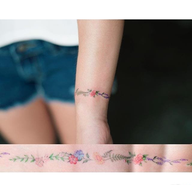点击大图看下一张：漂亮的小清新植物纹身小花朵纹身图案