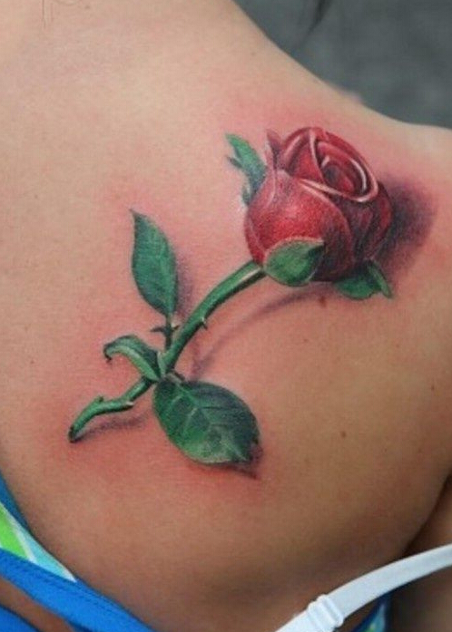 点击大图看下一张：美女后背潮流经典的3d玫瑰花彩绘纹身图案