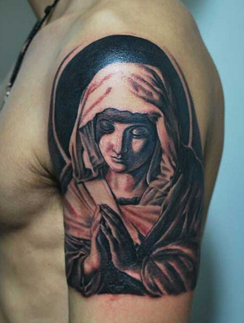 点击大图看下一张：男士手臂圣母玛利亚图案纹身