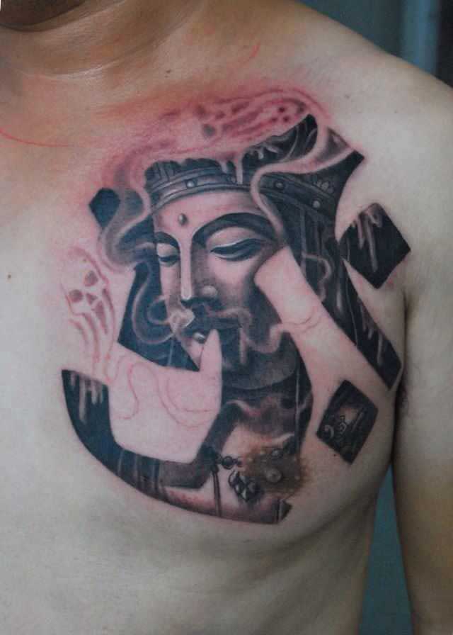 点击大图看下一张：男士胸口地藏王纹身图案