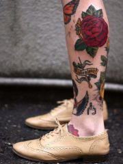 小腿彩绘蝴蝶与红色玫瑰纹身图案