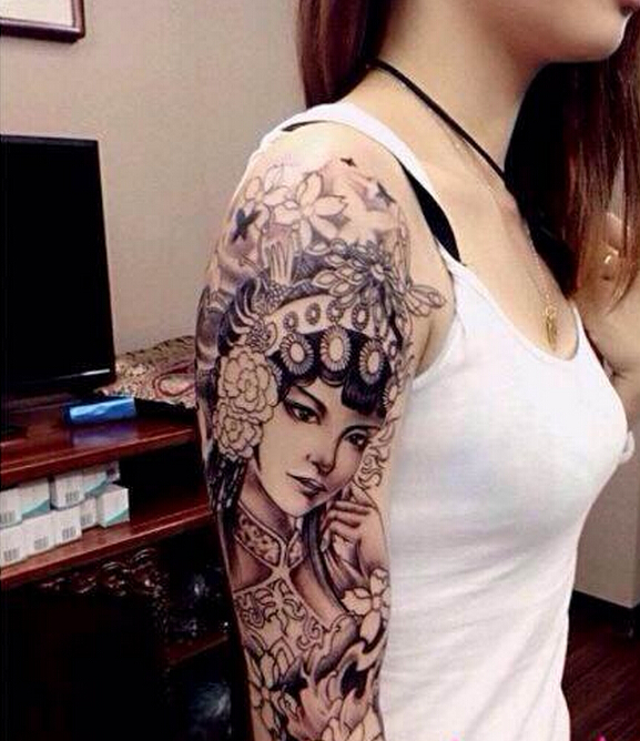点击大图看下一张：美女花臂花旦纹身图案