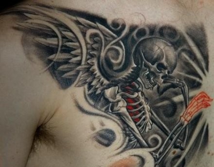 点击大图看下一张：胸部经典帅气的骷髅纹身图案